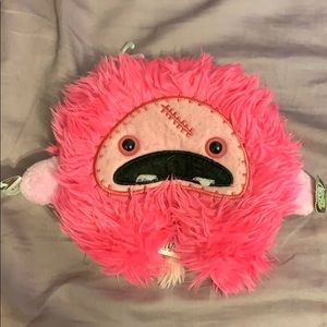 Pink monster stuffed animal